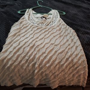 White sleeveless blouse